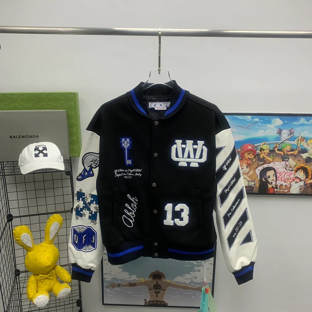 Top tested version 2023 off white heavy industry embroidery patchwork leather high temperature hot crystal diamond baseball uniform male and female couple star same style (⚠ original button mold customization, patch embroidery color matching) original packaging original label 🔍 full set of accessories customization packaging elevators are purchased from the original factory all hardware parts mold customization one-to-one restoration of fabric color components The fabric is made of 65% wool, 15% natural silk, 10% spandex and 10% velvet, mixed and custom-woven. The total weight is more than 900 grams! And the most important thing is its color fastness, it will never fade! -The embroidery uses an imported towel embroidery machine. Each pattern is first embroidered on the fabric, and then engraved with an infrared laser, and then fixed with a sewing machine. The whole garment is labeled in many places, one is flat embroidered, and the large pattern on the back is directly embroidered on it. This dress has 4 different embroidery techniques⚠ -The sleeves are all made of two-layer pebbled fabric, which is processed, shaped, colored, washed, and the texture retains the original grain structure! Thick, plump and round! -The processing technology is extremely complex, the cutting pieces are neatly aligned, and the entire garment has precise wiring density. Gender-neutral style. Loose fit, self-conscious quality control, details determine success or failure. Color: Black Size: S M L XL P: 680
